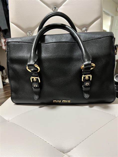 how to identify a miu mi u bag.